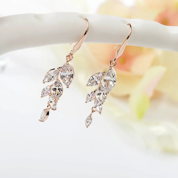 Fashion leaf earrings with zircon accents in rose gold white colour option on copper alloy base
