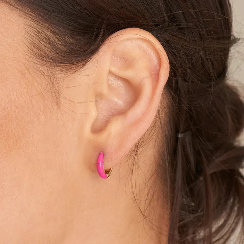 Geometric U-shaped epoxy earrings with a dripping oil finish in various colours.
