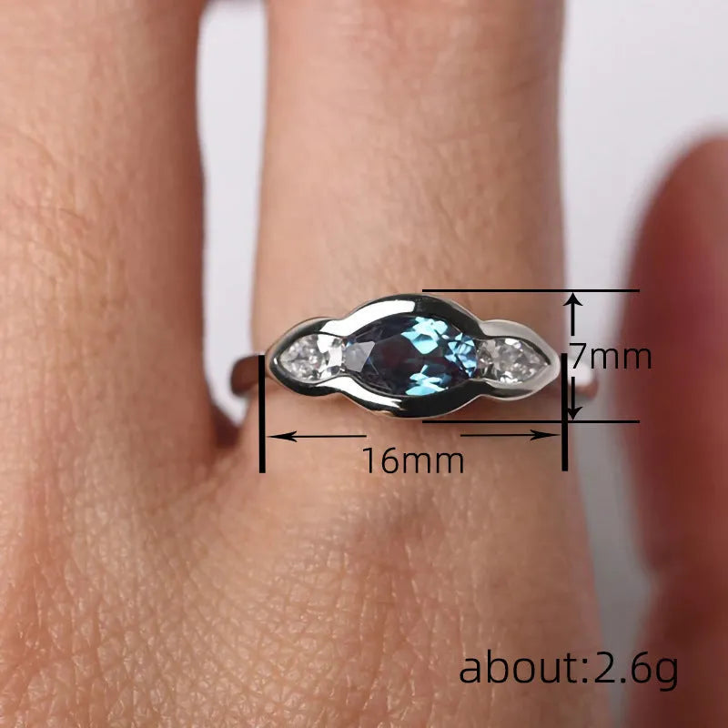 Women's geometric ellipse copper ring with white gold plating and zircon stones in UK sizes 6 to 10