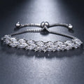 Women's round shape horse eye zircon bracelet in gold finish with inlaid gemstone on copper base