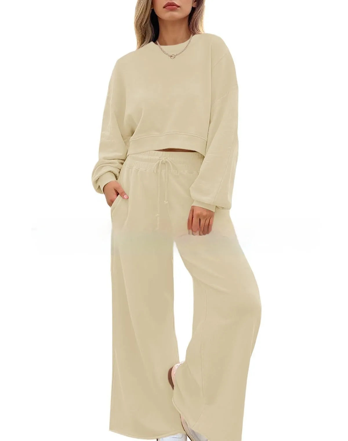 Women's solid colour polyester two-piece casual set with long sleeves and trousers.