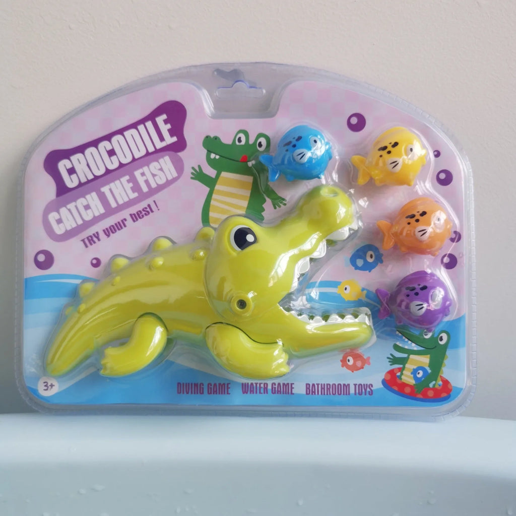 Green ABS plastic crocodile eating small fish bath toy set with four small fish