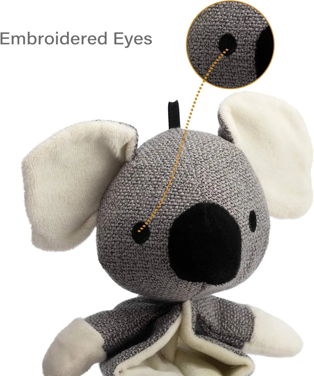 Grey koala plush dog toy measuring 30cm long with crinkle paper inside for squeaky sounds.
