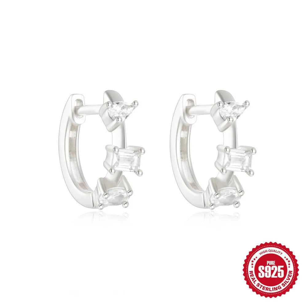 Sterling silver geometric stud earrings with small round diamond accents in gold or silver electroplated finish