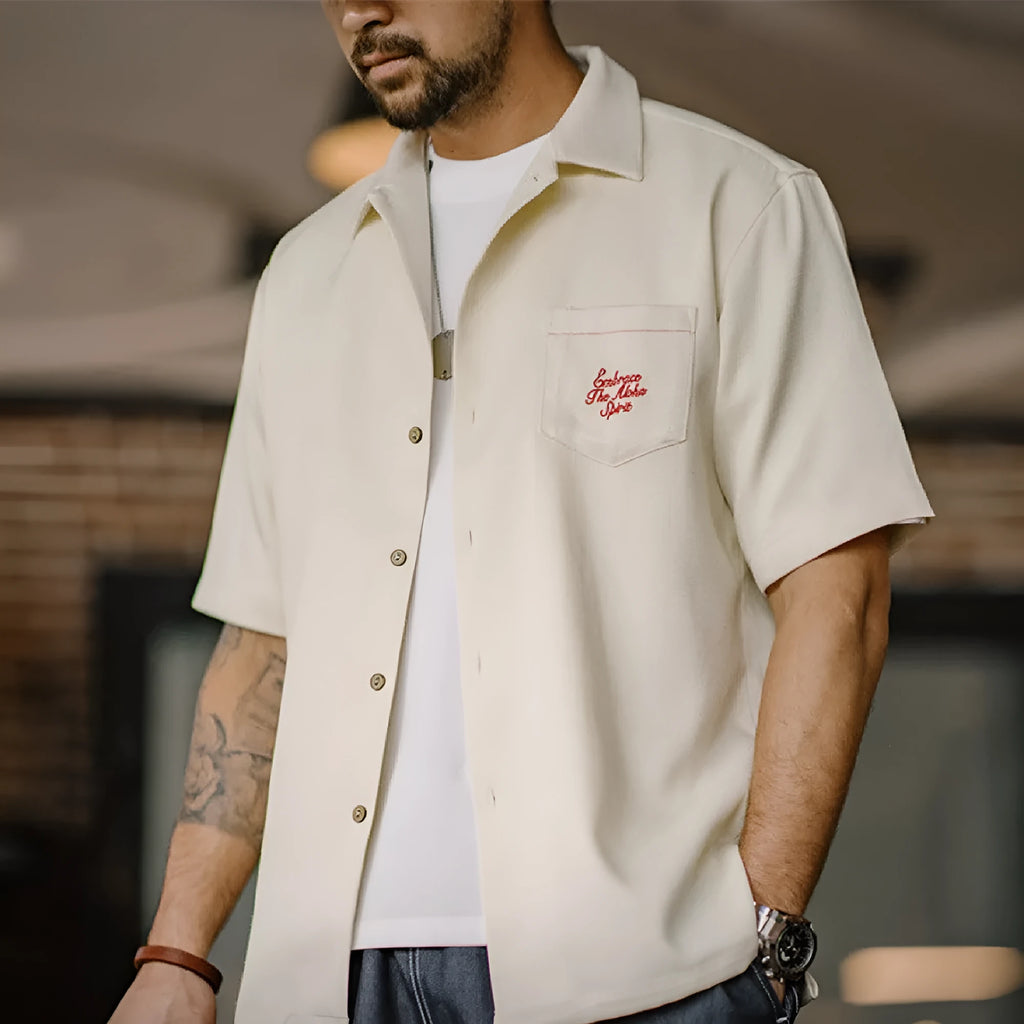 Light apricot men's Cuban collar shirt with bamboo plant and floral pattern