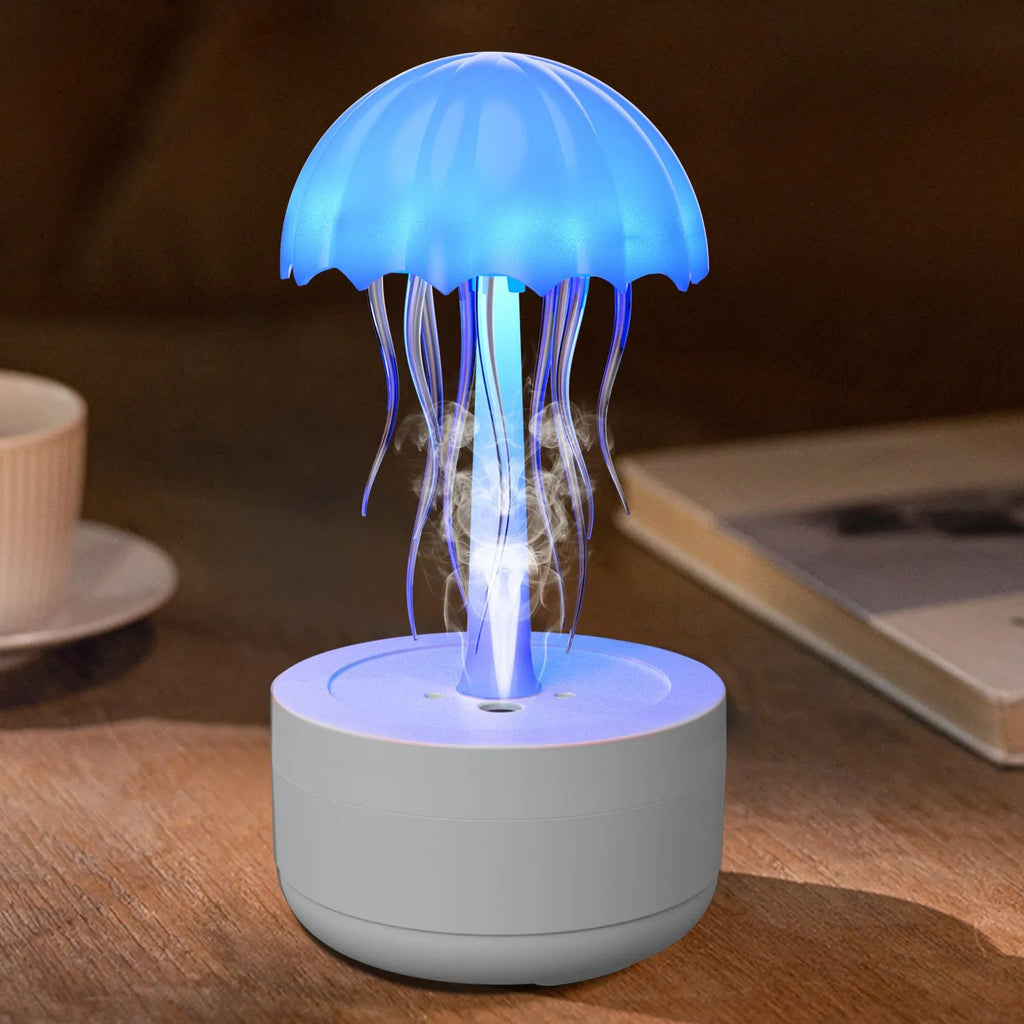 White jellyfish humidifier diffuser with colourful night light on desktop