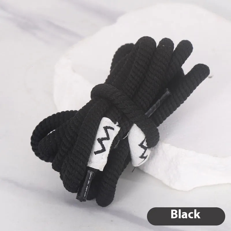 Oval elastic shoelace adapter ropes in various colours on a white background.