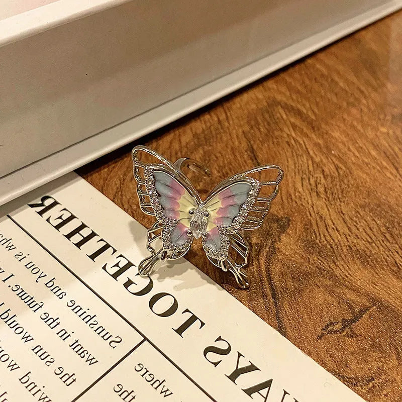 Copper Chinese butterfly women's ring showing creative design with oil dripping treatment finish