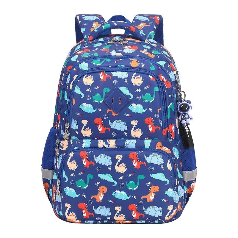Blue children's waterproof school backpack with dinosaur pattern and curved shoulder straps on a white background.