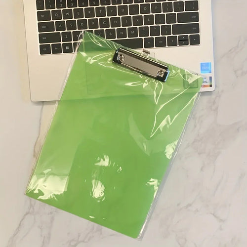 Transparent A4 plastic writing board pad with a silver metal clip, shown in blue colour.