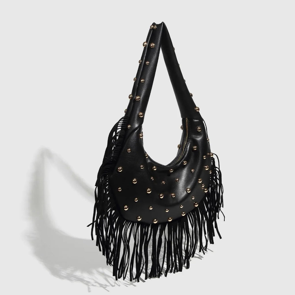 Retro black tassel shoulder handbag with mobile phone pocket showing decorative detailing