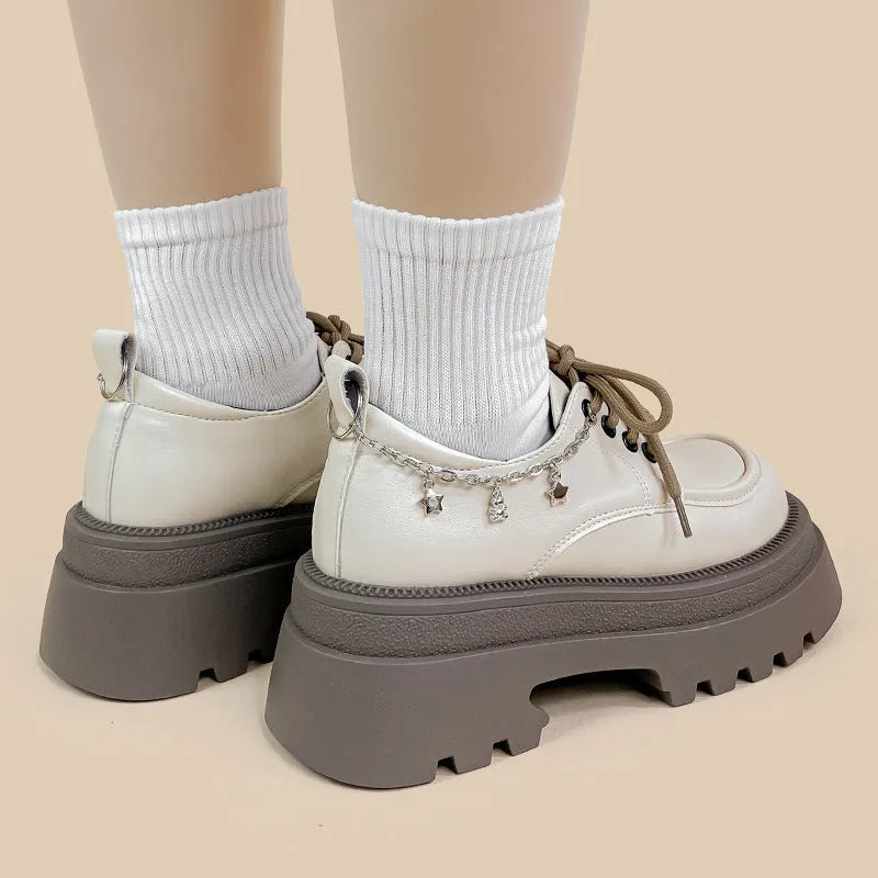 White women's platform leather shoes with chunky heel and lace-up front
