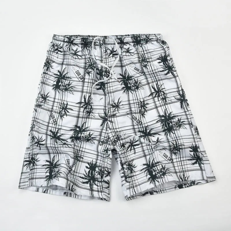 Men's printed five-point swimming trunks with floral pattern in polyester fabric