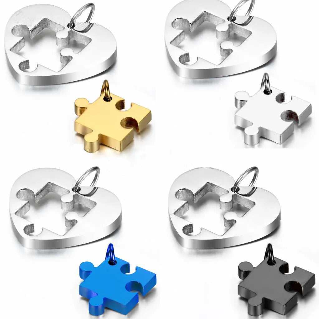 Glossy stainless steel love puzzle couple pendant in silver finish, heart shape 52mm long