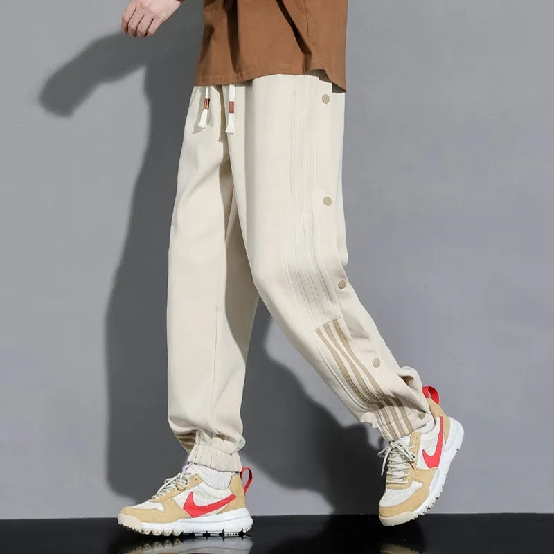 Men's loose fit cotton blend sports trousers with ankle tie fastenings and drawstring waist