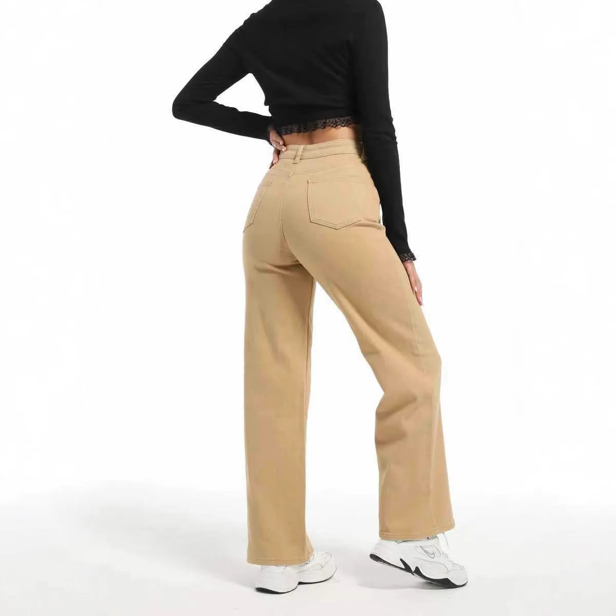 Women's apricot high-waist wide-leg straight jeans on a hanger