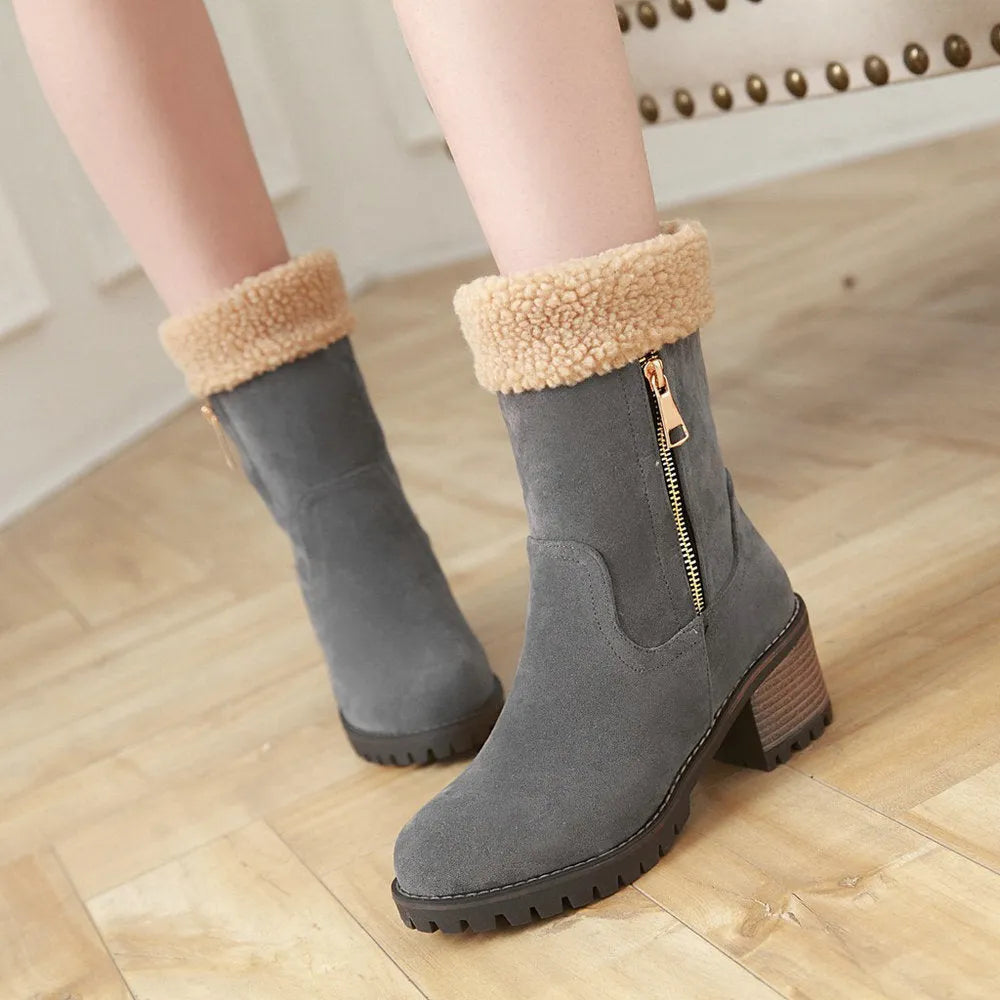 Snow boots with rubber sole and plush lining in black, grey, green, or orange.