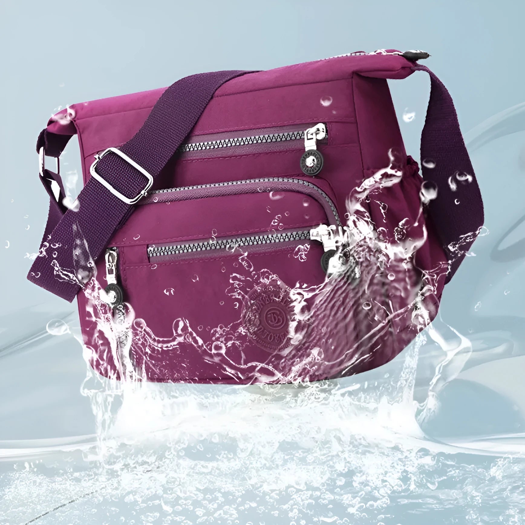 Soft nylon messenger shoulder bag in a choice of five colours including black and blue.