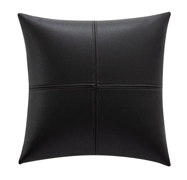 Solid colour soft cowhide leather pillow cover in Nordic style on a grey sofa.