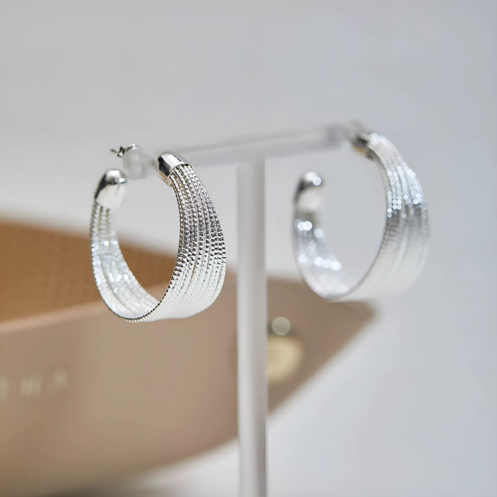 Copper geometric multi-layer bracelet earrings in silver or gold finish, available as clip-on or stud styles