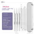 Four silver metal acne needles with pointed tips for skincare extraction