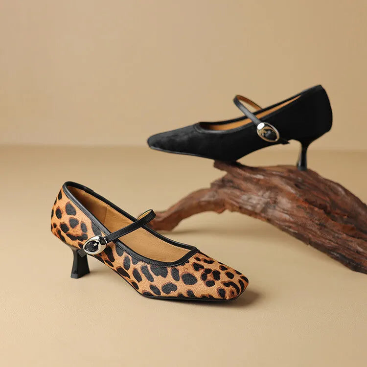 Women's black square toe stiletto ankle-strap heels with a horse hair upper.