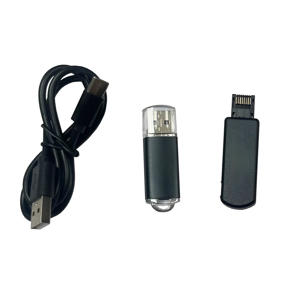 Black aluminium alloy PS4 USB firmware tool with data cable on a dark surface.
