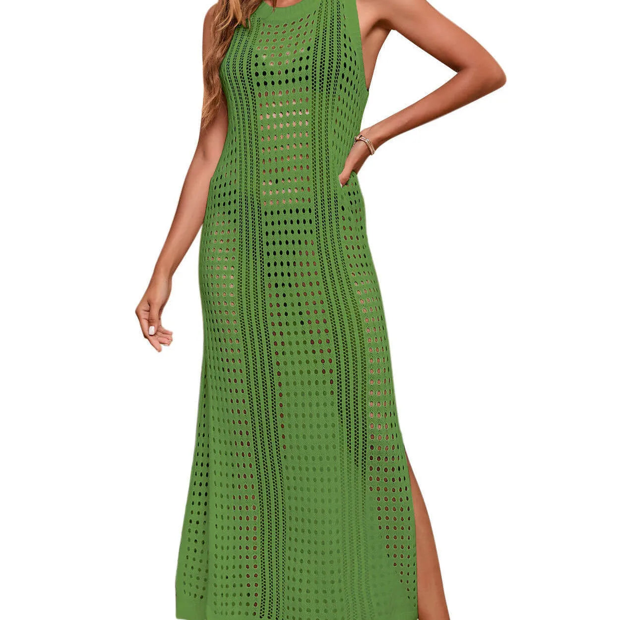 Long loose women's beach blouse in hollow-out knit, shown in a solid colour, laid flat.