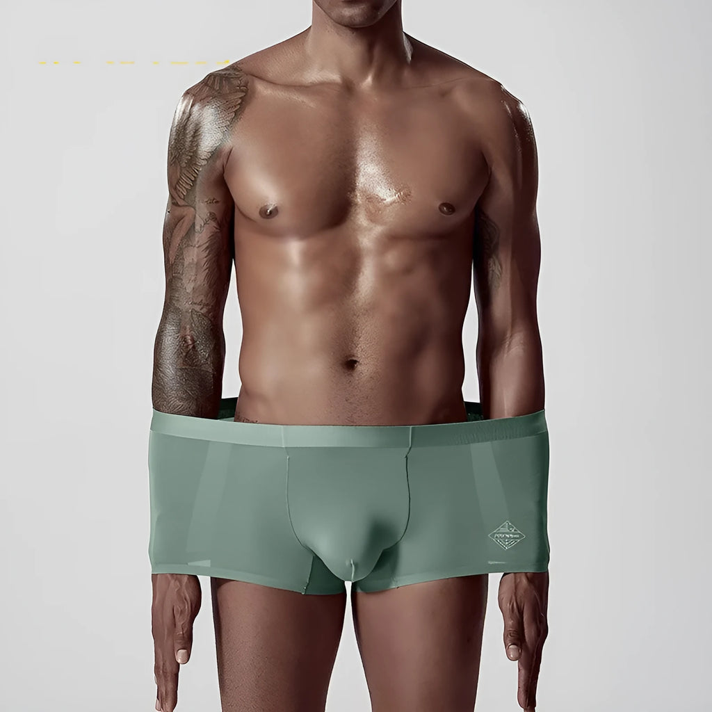 Men's seamless modal underwear in green, pink, and white with mid waist design