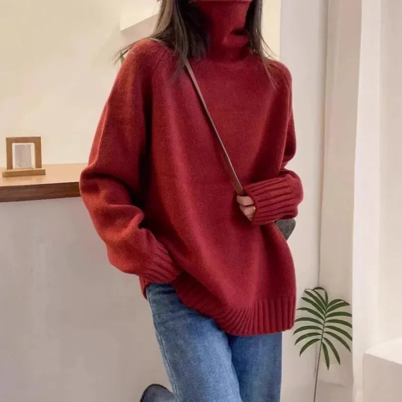 Women's loose red turtleneck sweater with thick curling pile collar, casual style.