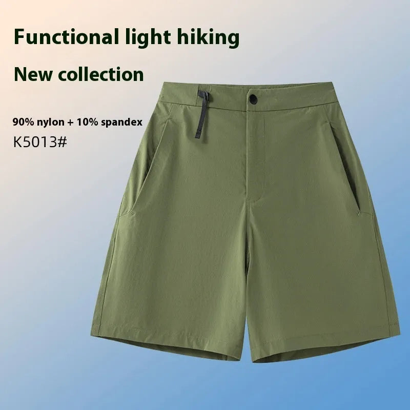 Men's quick-drying sports shorts in Army Green colour on a grey background.