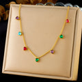 Gold-plated stainless steel heart necklace on a model, showing adjustable length.