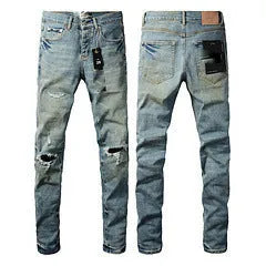 Black slim fit skinny jeans with straight leg, button fly, and manual distressing detail.
