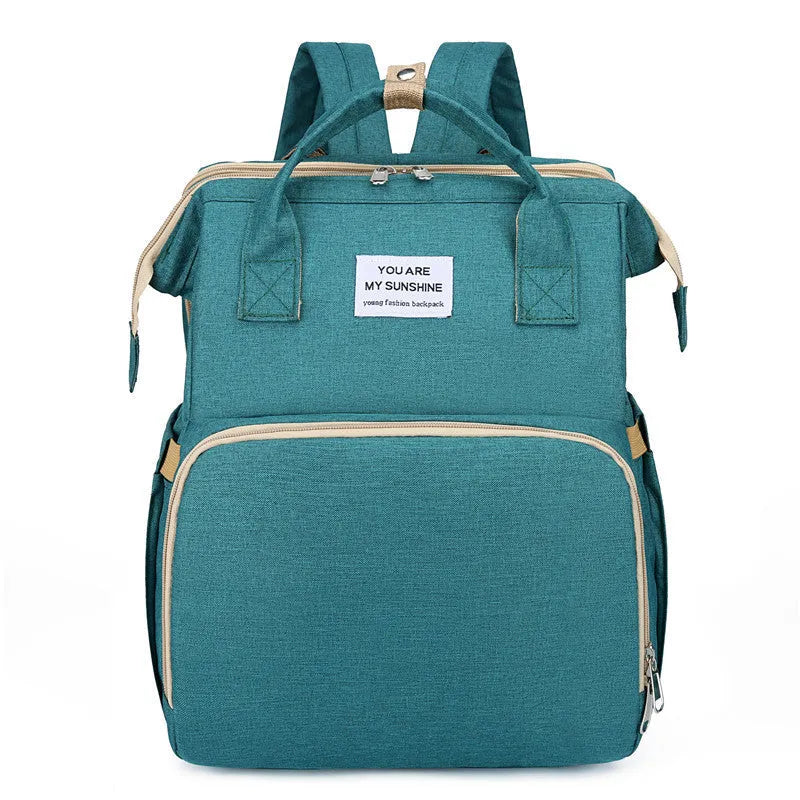Portable folding crib mummy bag in nylon with USB interface and curved shoulder strap