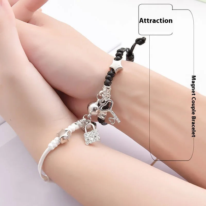 Magnetic couple bracelet pair with alloy electroplating in various designs including clover and crown patterns