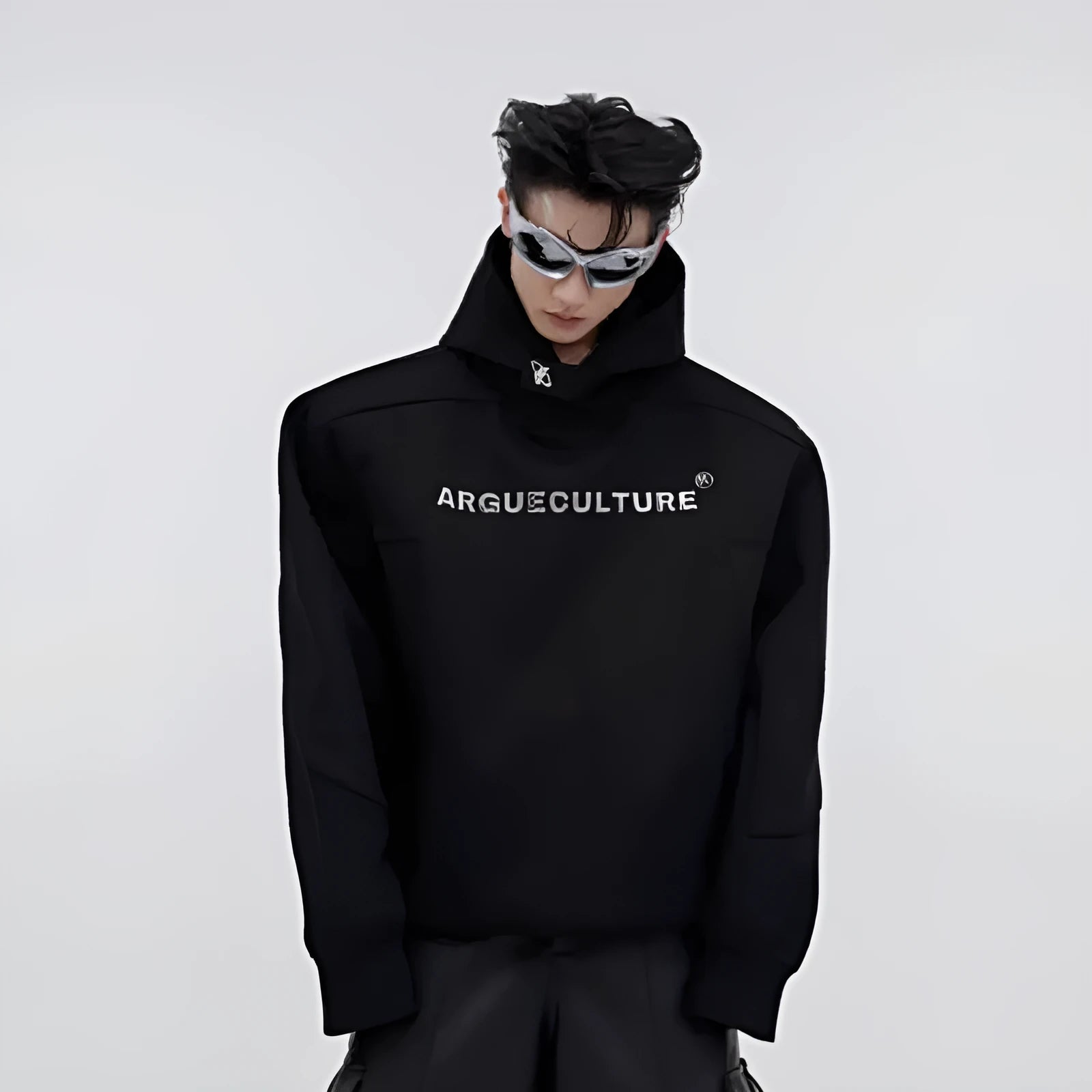 Red men's hooded sweater with heavy shoulder pads and 3D printing detail on a loose fit.