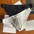 Men's cotton briefs in solid colours showing mid waist and triangle design