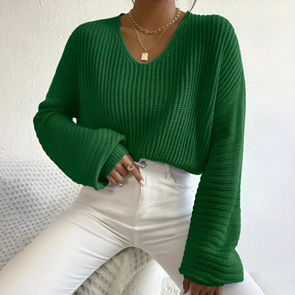 Women's loose fit long sleeve pullover top in solid colour with regular sleeves