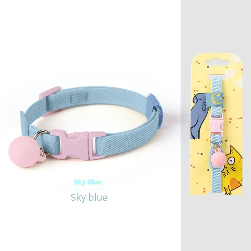 Small elastic polyester dog collar shown in various colours, adjustable from 22 to 32 cm for tiny dog breeds.