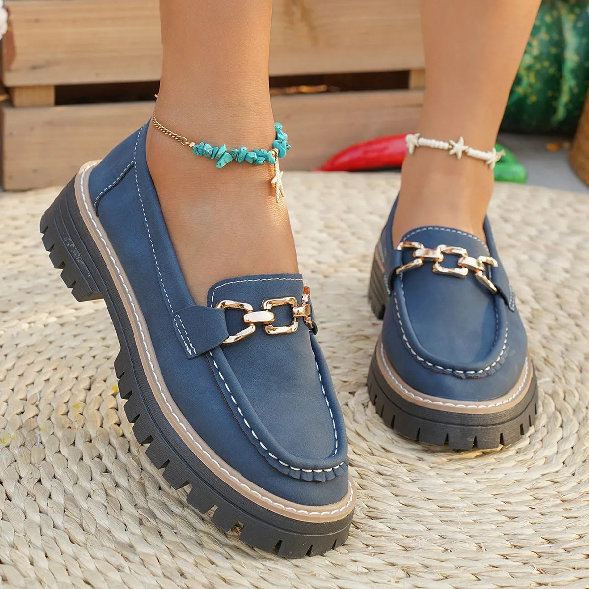 Women's flat bottom loafers with a thick platform heel in a solid colour, PU upper, and round toe shape.
