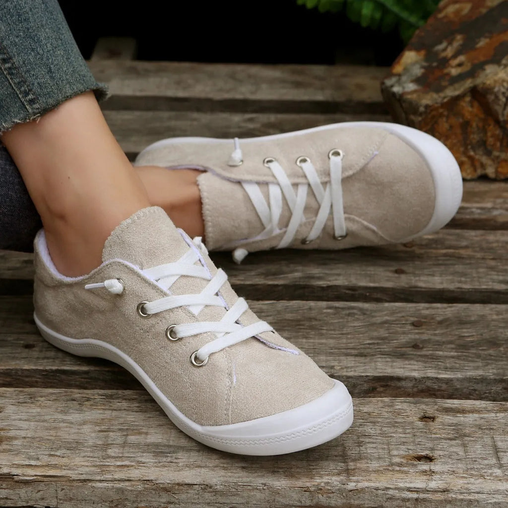Women's creamy-white casual sneakers with fabric upper and rubber sole
