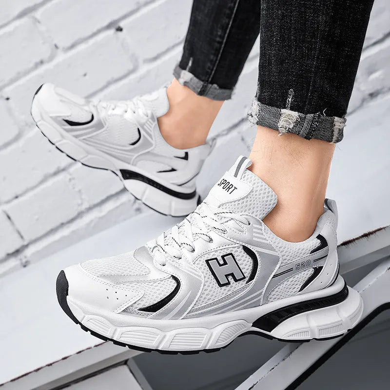 Men's mesh running shoes in black, white grey, or white orange with plastic soles