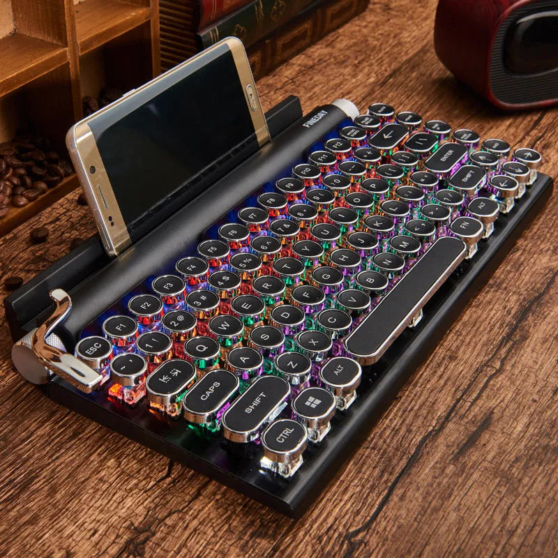 Black retro-style Bluetooth mechanical keyboard with backlit keys on a desk