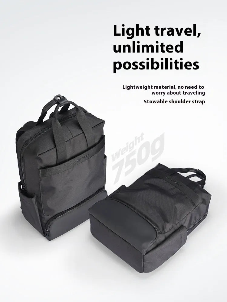 Black Oxford cloth computer backpack with 20-35L capacity showing interior polyester lining