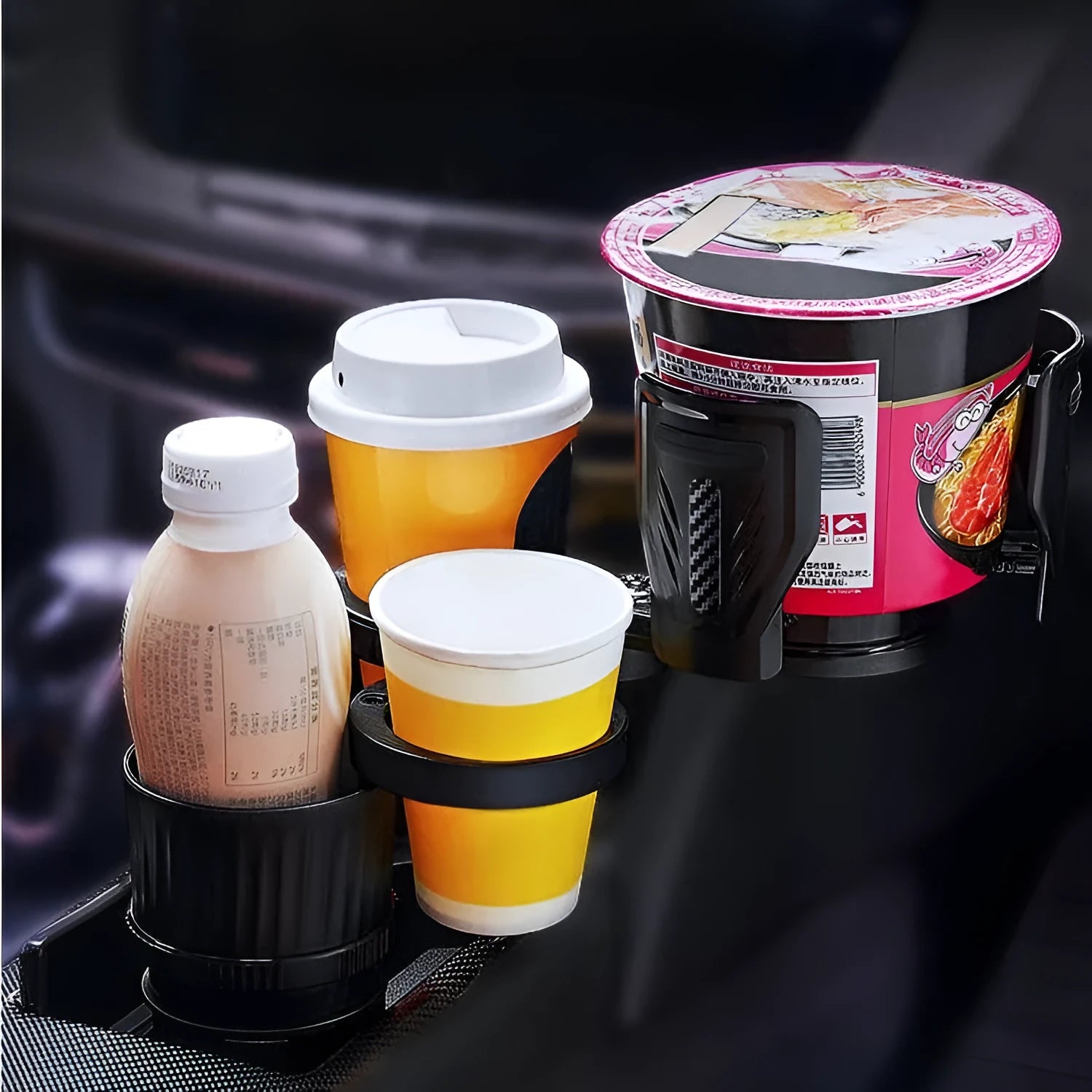 Carbon fibre black car cup holder with retractable base for one point four compass mounts.