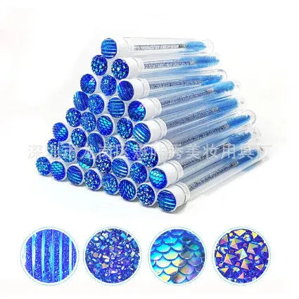 Disposable mascara brushes in protective transparent tubes with spiral brush heads in blue, green, pink, and purple colours