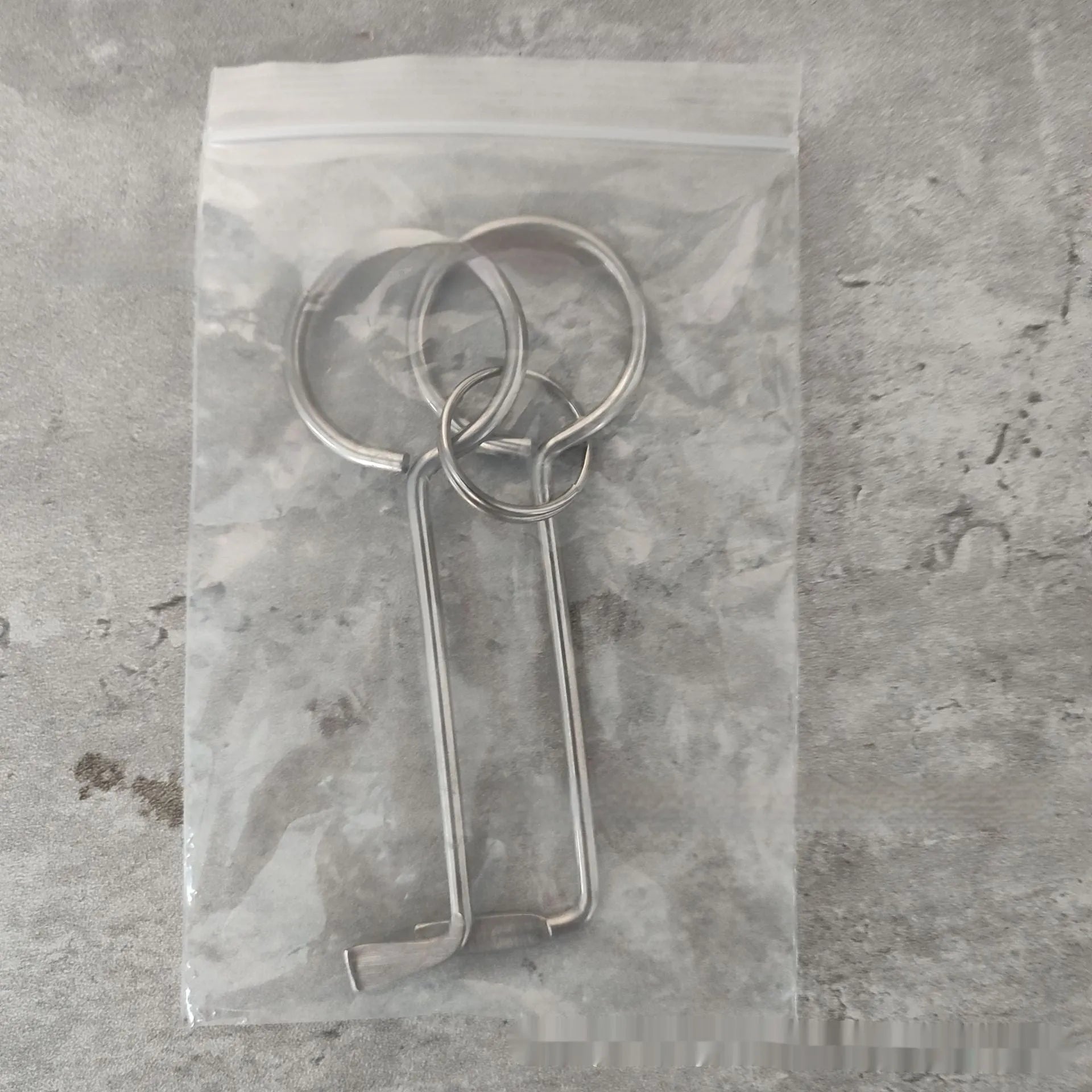 Two alloy wrench tools from portable household maintenance set