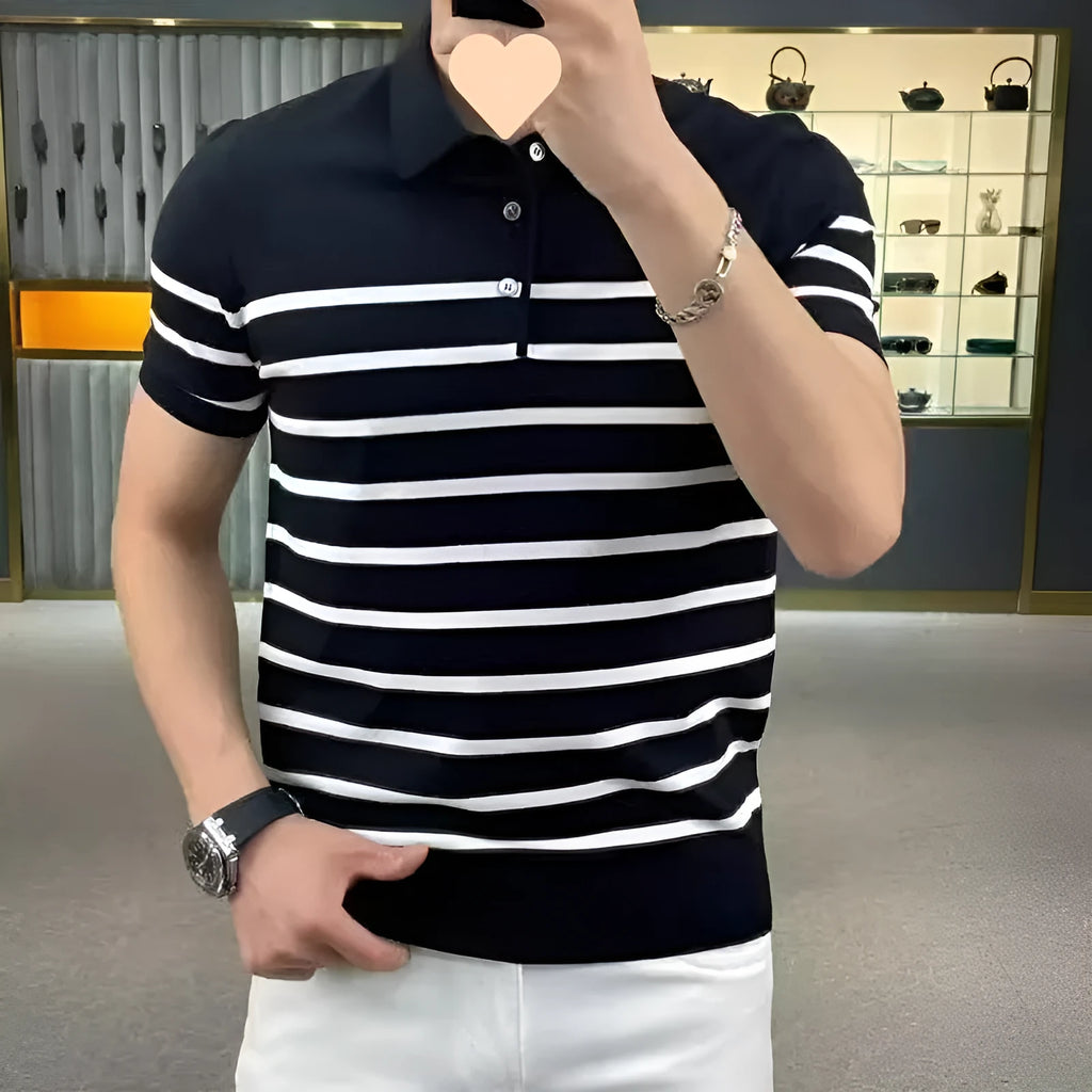 Black and white striped men's knit t-shirt with a lapel collar, laid flat.