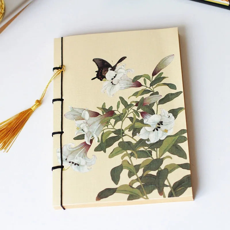 A5 antique wire-bound notebook with retro painting design on white cowhide cover
