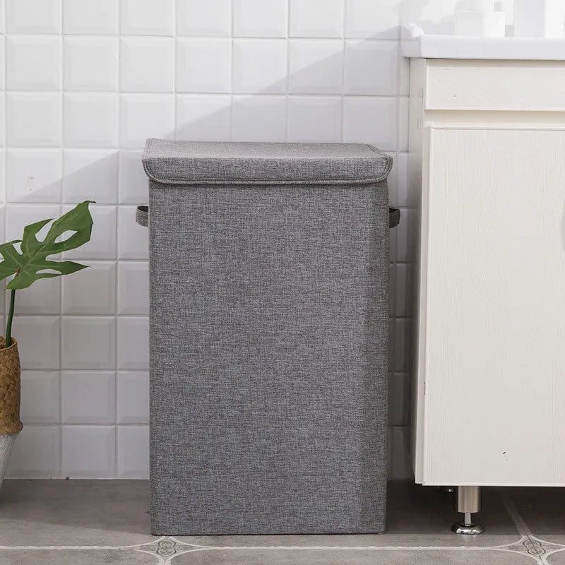 Grey foldable cotton linen clothes storage basket in a modern simple style